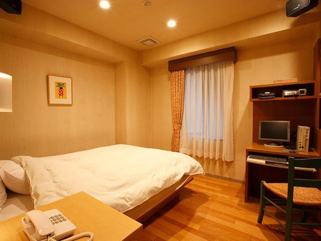 โรงแรมt พอยต์ โอซาก้า ภายนอก รูปภาพ